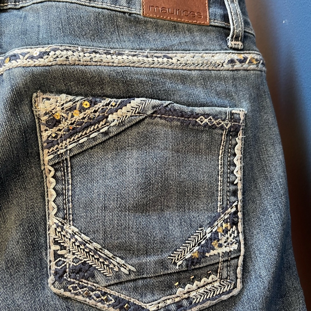 Maurice’s mid rise embellished jeans.
